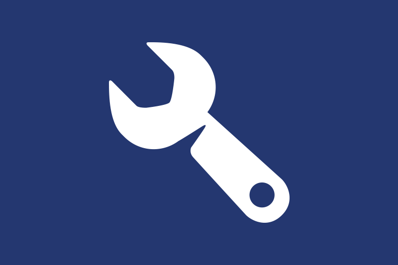 White wrench icon on a blue background