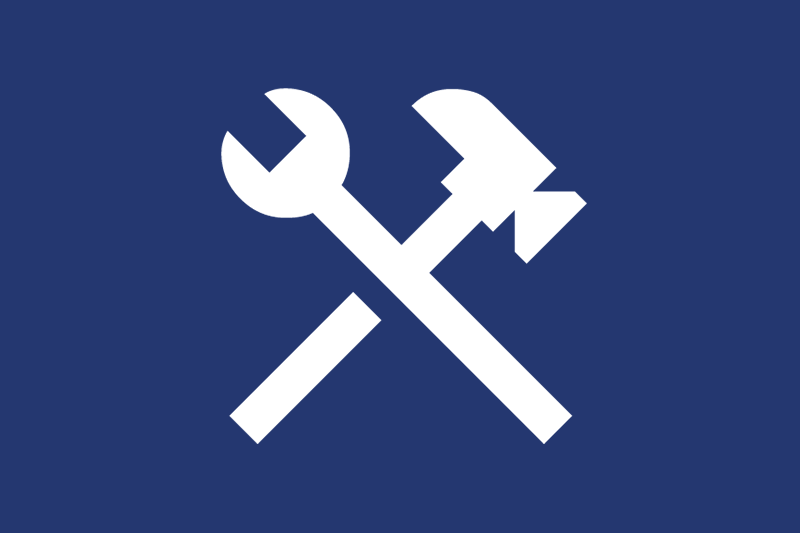 White hammer and wrench icon on a blue background