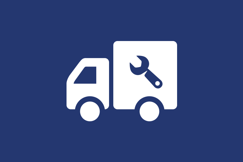 White diesel truck icon on a blue background